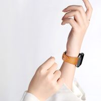 WiWu Vintage Lederarmband für das  Apple Watch Series 1 t/m 11 / SE / Ultra (44/45/46/49 mm) - lichtbruin