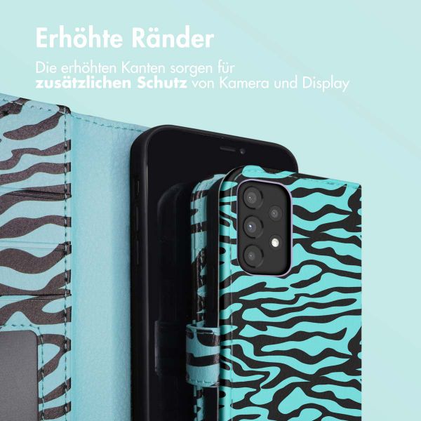 imoshion Design Klapphülle für das Samsung Galaxy A33 - Black Blue Stripes