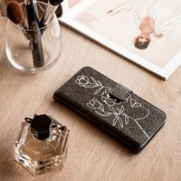 imoshion Design TPU Klapphülle Galaxy S10 - Woman Flower Black