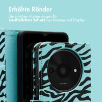 imoshion Design Klapphülle für das Xiaomi Redmi A3 - Black Blue Stripes