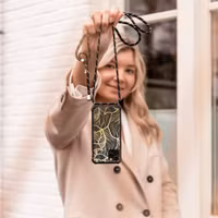 imoshion Design Hülle mit Band für das Samsung Galaxy S10 Plus - Golden Leaves