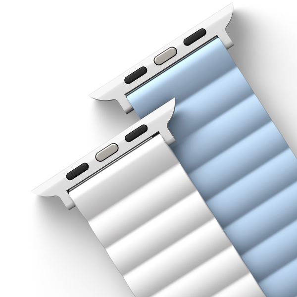 Uniq Revix doppelseitiges Armband für das  Apple Watch Series 1 t/m 11 / SE / Ultra (44/45/46/49 mm) - Arctic (White/Blue)