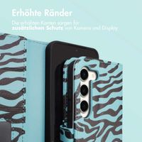 imoshion ﻿Design Klapphülle für das Samsung Galaxy S23 - Black Blue Stripes