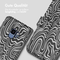 imoshion ﻿Design Klapphülle für das Samsung Galaxy S9 - Black And White