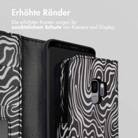 imoshion ﻿Design Klapphülle für das Samsung Galaxy S9 - Black And White