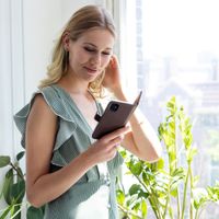 Selencia Echtleder Klapphülle Apple iPhone 12 (Pro) - Braun