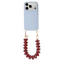 Selencia Rivièra MagSafe Backcover mit abnehmbaren Haken für das Apple iPhone 17 Pro - Powder Blue + Lova Handykette - Burgundy