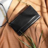 Selencia Clutch Klapphülle aus Leder mit herausnehmbarem Case iPhone 12 (Pro)