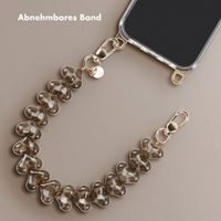 Transparentes Backcover mit abnehmbaren Haken für das Apple iPhone 16 Pro Max + Lova Handgelenkband - Tortoise Leopard