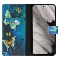 imoshion Design TPU Klapphülle für das Google Pixel 8 Pro - Blue Butterfly