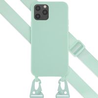 Selencia SilikonHülle mit abnehmbarem Band iPhone 12 (Pro) - Türkis